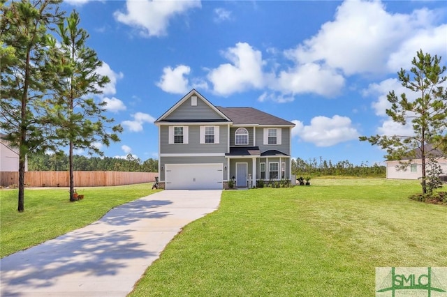 view of front of property with driveway, an attached garage, fence, and a front yard