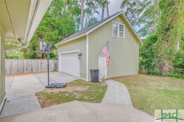 garage with a lawn