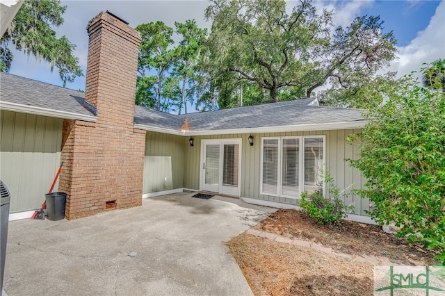 rear view of house with a patio