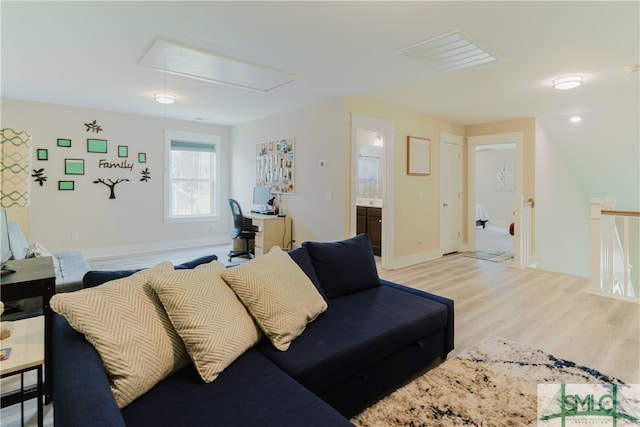 living room with light hardwood / wood-style floors