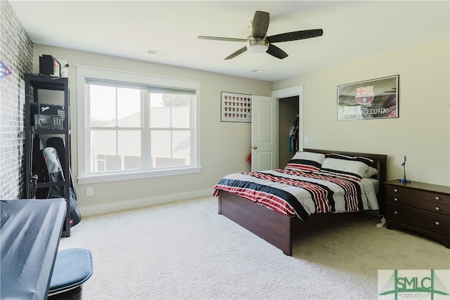 bedroom with ceiling fan and carpet floors