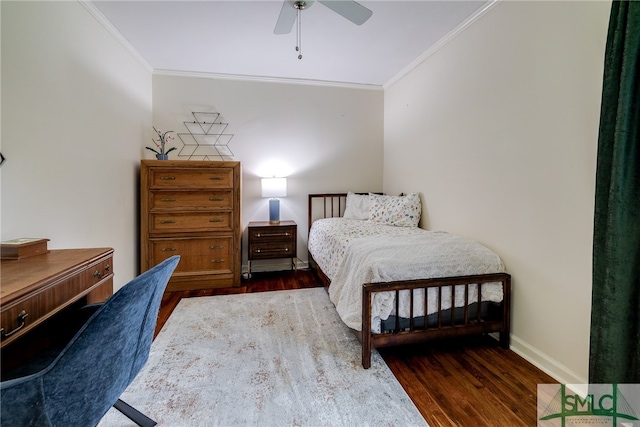 bedroom featuring crown molding, ceiling fan, and dark hardwood / wood-style floors