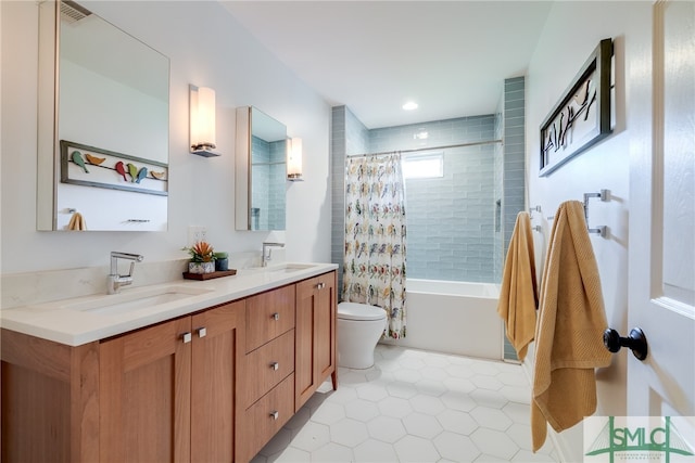 full bathroom with vanity, toilet, shower / tub combo with curtain, and tile patterned flooring