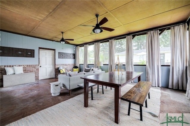 interior space with wood ceiling and ceiling fan