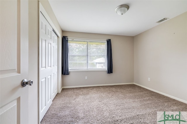 spare room with carpet flooring