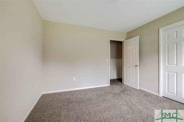 unfurnished bedroom with carpet flooring