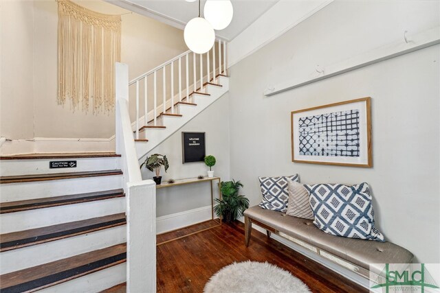 stairway featuring hardwood / wood-style flooring