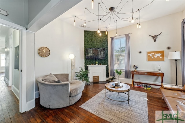 living room with dark wood-type flooring