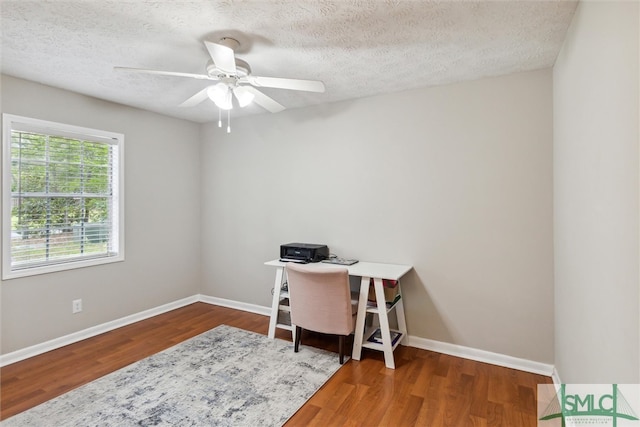 office with a textured ceiling, hardwood / wood-style floors, and ceiling fan