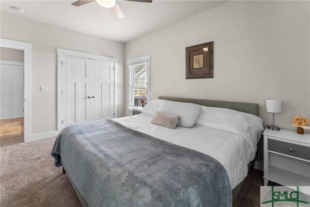 bedroom with dark wood-type flooring and ceiling fan