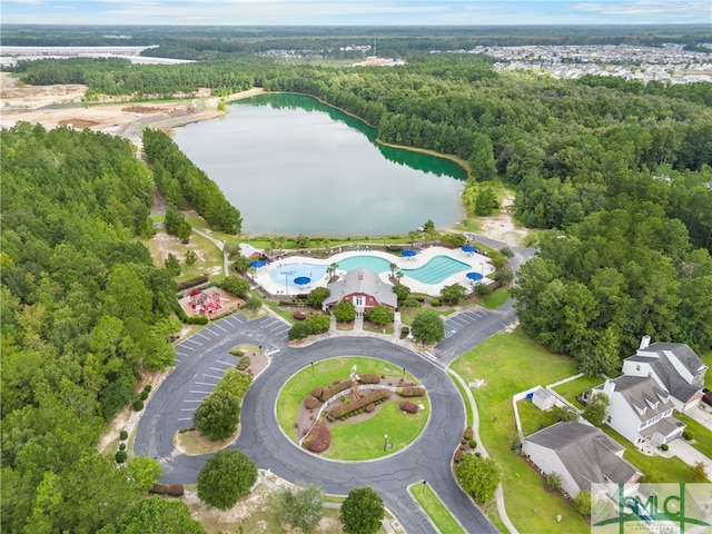 birds eye view of property with a water view