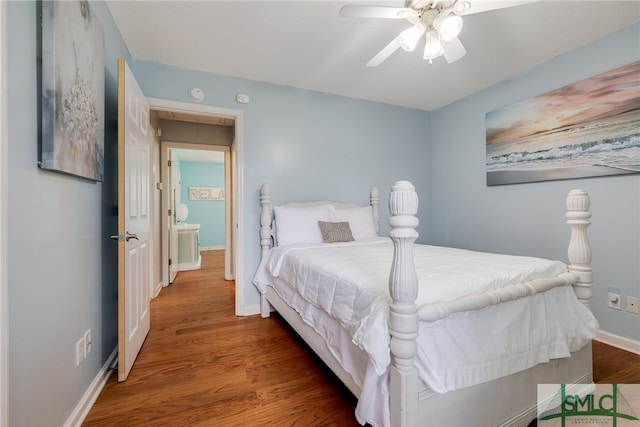 bedroom with ceiling fan and hardwood / wood-style flooring