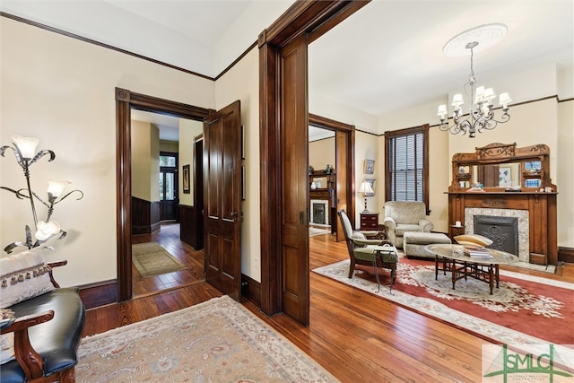 interior space featuring a chandelier and dark hardwood / wood-style floors