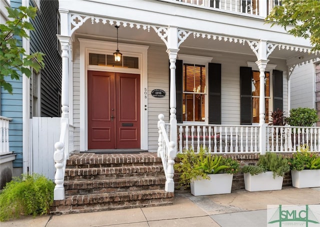 entrance to property with covered porch