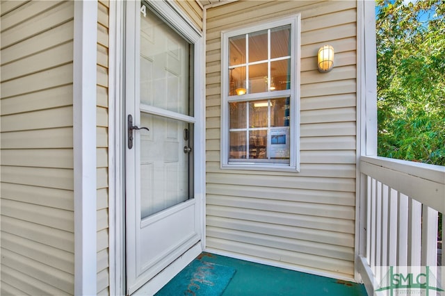 doorway to property with a balcony