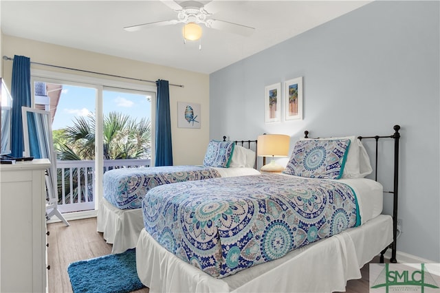 bedroom with light wood-type flooring, access to outside, and ceiling fan