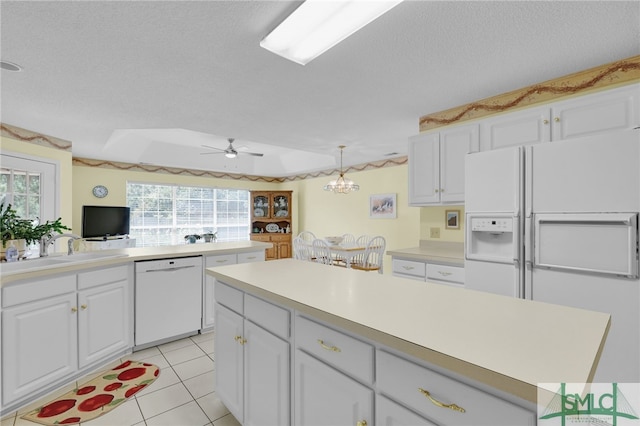 kitchen with white cabinets, white appliances, light tile patterned flooring, and ceiling fan