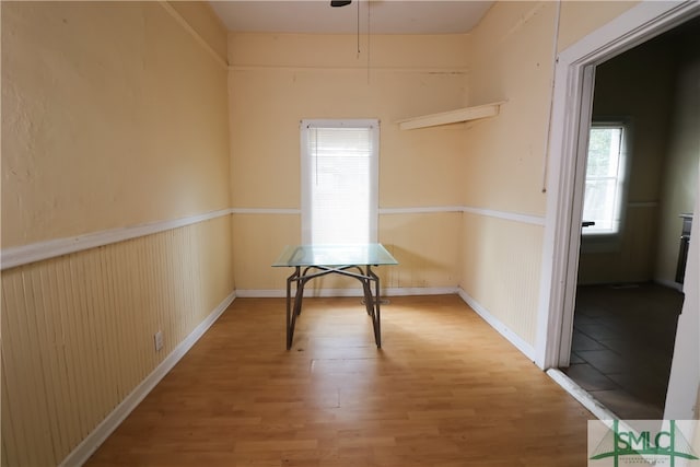 unfurnished dining area with hardwood / wood-style flooring