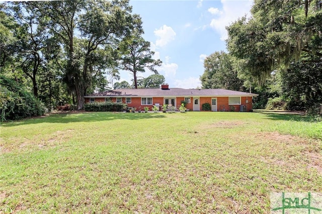 exterior space featuring a front lawn