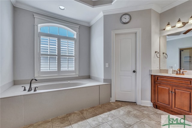 bathroom with crown molding, a tub, vanity, and tile patterned flooring