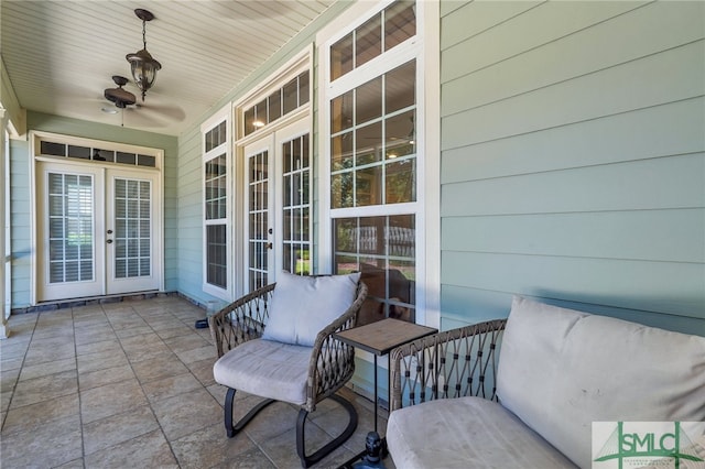 view of patio featuring ceiling fan