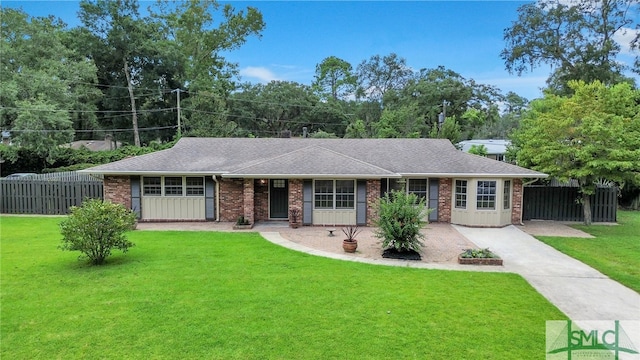 ranch-style house with a front lawn