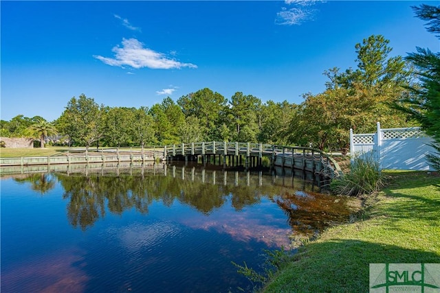 property view of water with fence