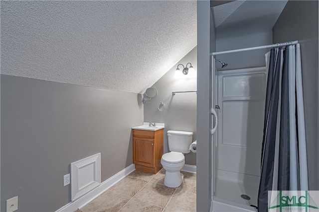 bathroom with toilet, lofted ceiling, a shower with curtain, vanity, and a textured ceiling