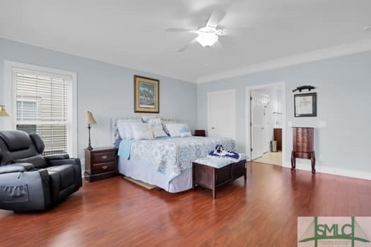 bedroom featuring wood finished floors