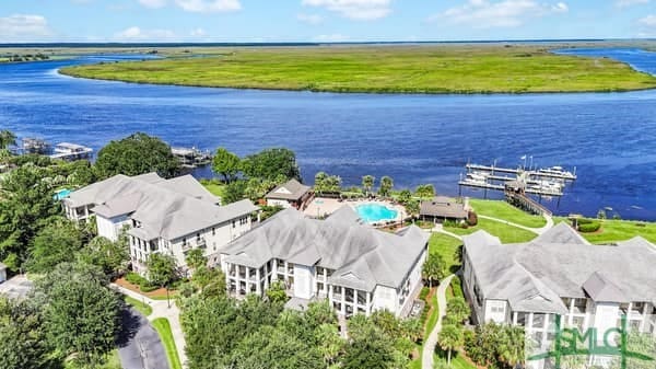 drone / aerial view with a water view