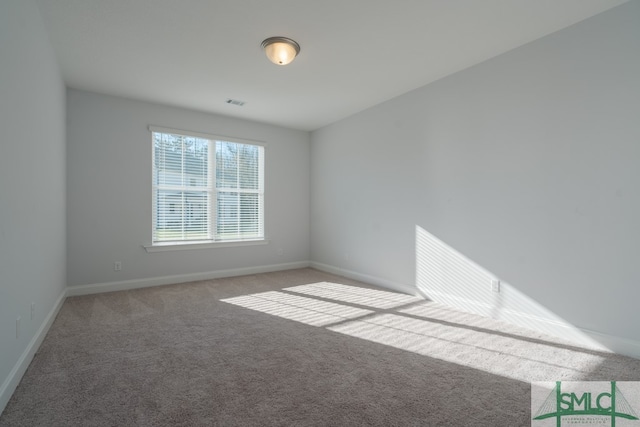 empty room with carpet flooring