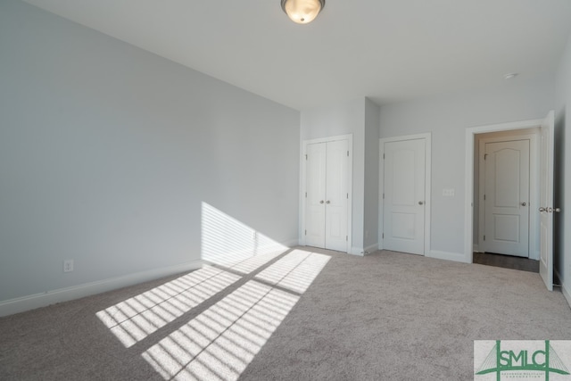 unfurnished bedroom featuring carpet floors