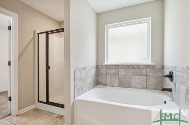 bathroom with independent shower and bath