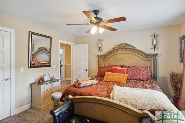 carpeted bedroom with ceiling fan and baseboards