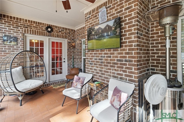 view of patio featuring a ceiling fan