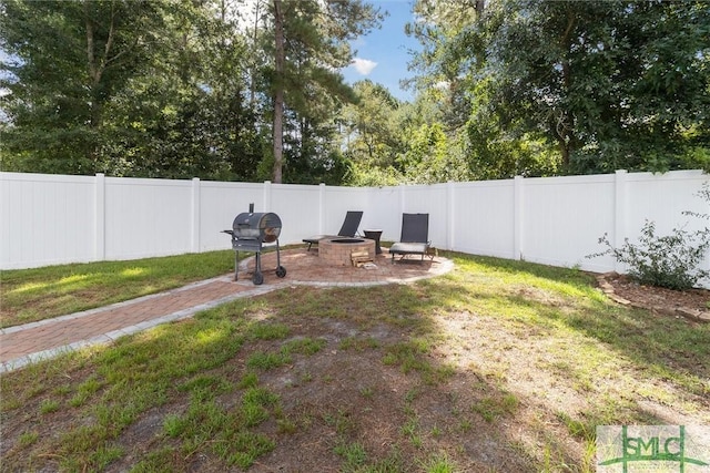 view of yard with a patio and a fenced backyard