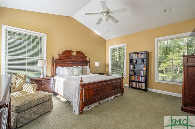 carpeted bedroom with lofted ceiling and ceiling fan