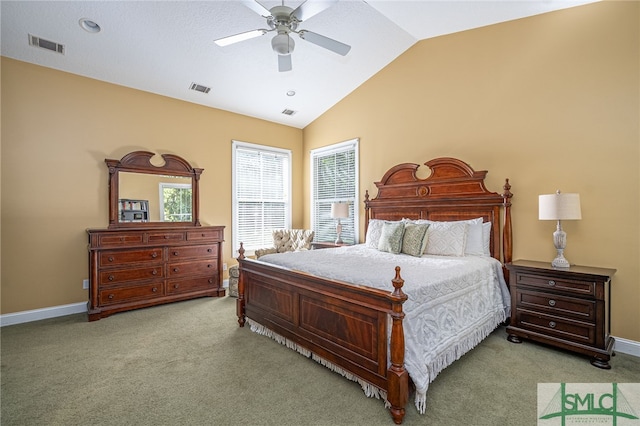 carpeted bedroom with ceiling fan and vaulted ceiling