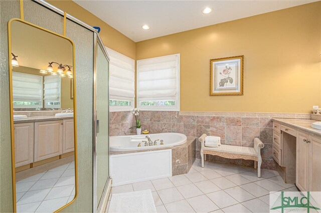 bathroom with tile patterned flooring and vanity