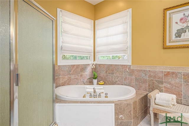 bathroom with independent shower and bath