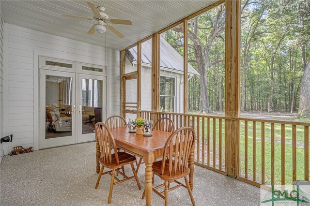 sunroom with a wealth of natural light and ceiling fan