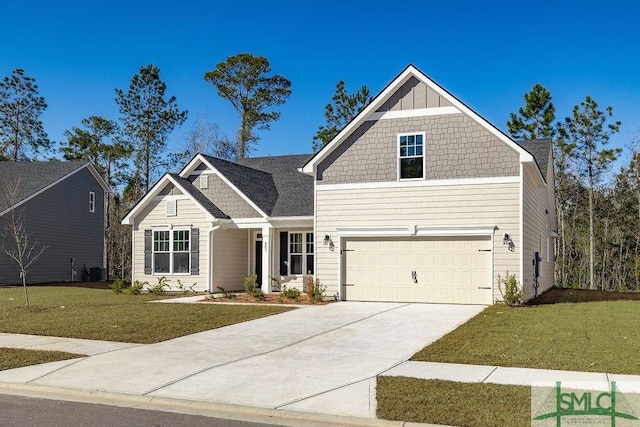 craftsman house with a front lawn and a garage