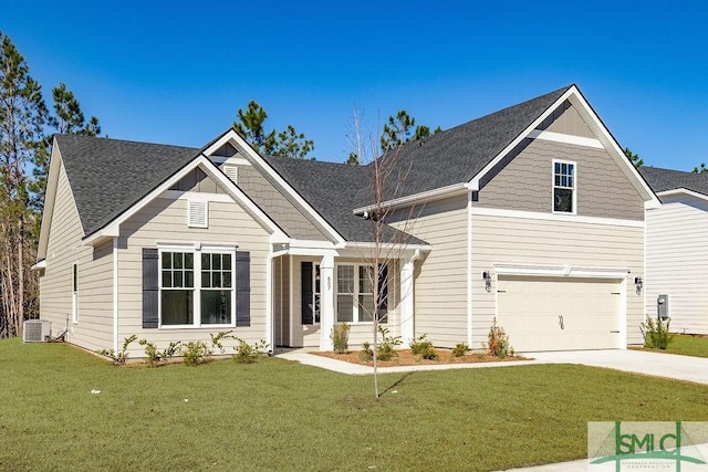 craftsman-style home featuring a front yard, a garage, and central AC