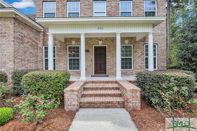 property entrance with a porch