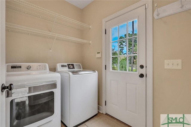 laundry room featuring independent washer and dryer