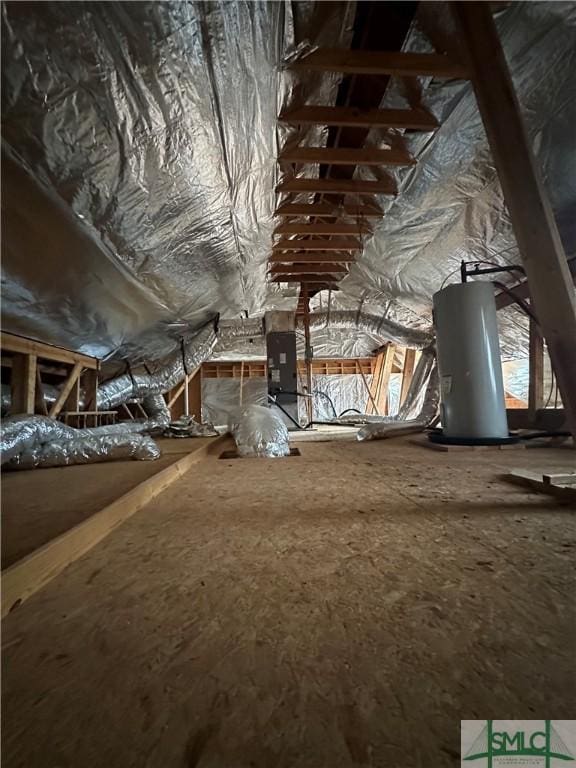 unfinished attic with water heater