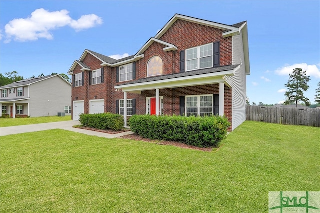 view of front facade featuring a garage and a front yard