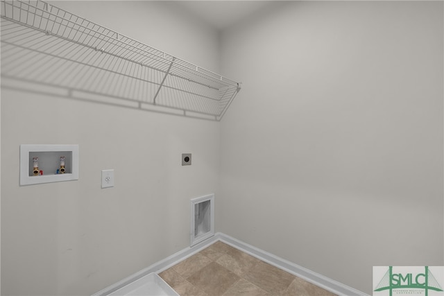 washroom with washer hookup, laundry area, baseboards, and electric dryer hookup