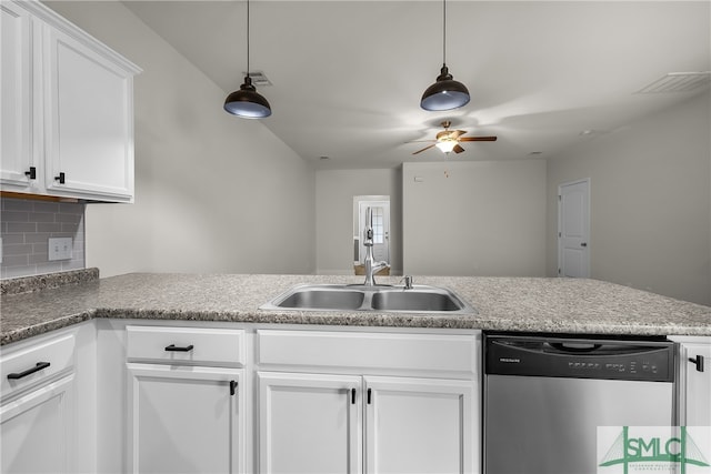 kitchen with white cabinetry, sink, stainless steel dishwasher, pendant lighting, and decorative backsplash