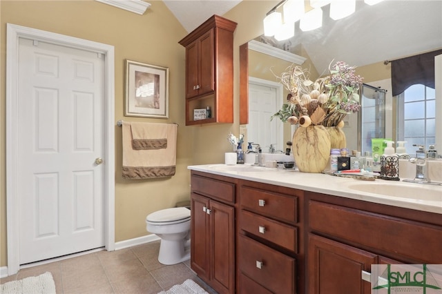 bathroom with tile patterned floors, vanity, vaulted ceiling, crown molding, and a shower with shower door